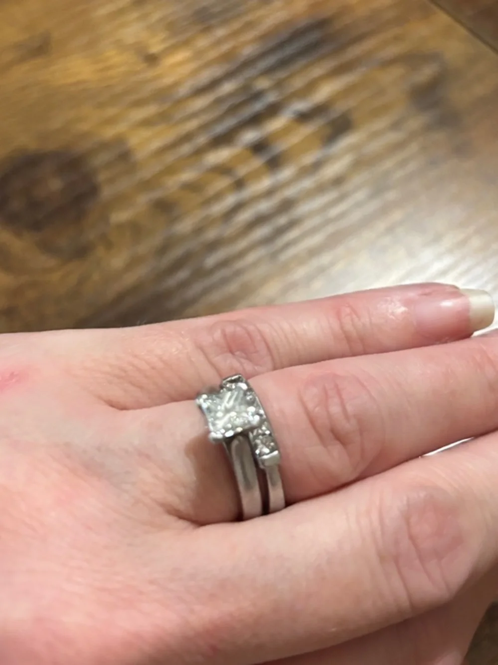 .9 solitaire platinum princess cut ring and wedding band with 5 VS1 diamonds.